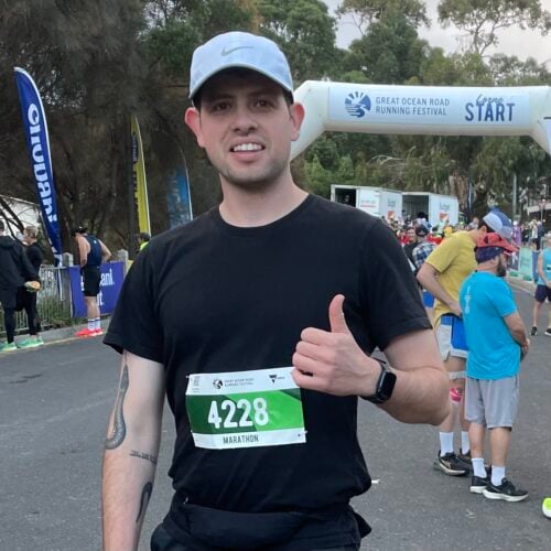 Scott with a thumbs up. Before running in the great ocean rd marathon